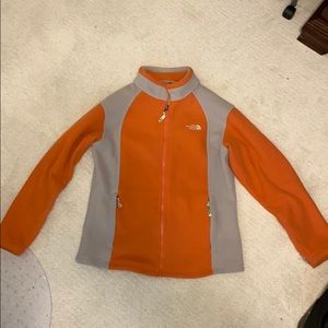 Salmon/orange women’s north face fleece jacket